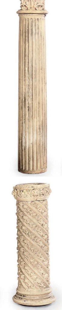 A PAIR OF COMPOSITE STONE COLUMNS