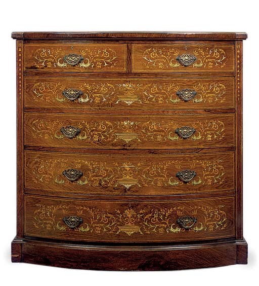 AN EDWARDIAN ROSEWOOD AND INLAID BOWFRONT CHEST