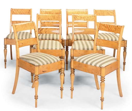 A SET OF EIGHT BIEDERMEIER SATIN BIRCH DINING CHAIRS