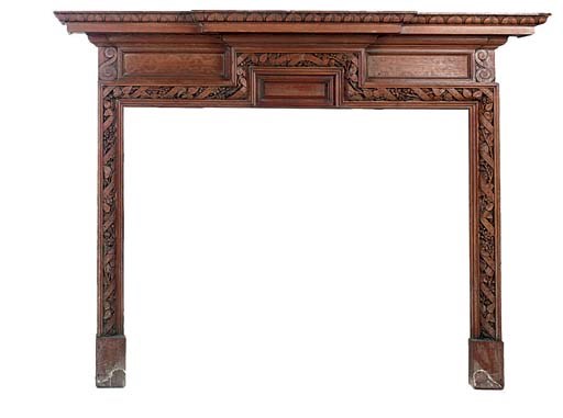 A LATE VICTORIAN CARVED OAK CHIMNEYPIECE