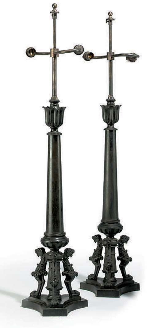 A PAIR OF BRONZE TABLE LAMPS