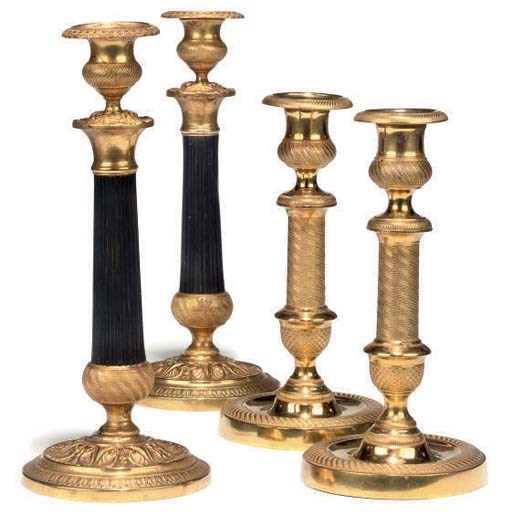A PAIR OF FRENCH GILT BRASS CANDLESTICKS