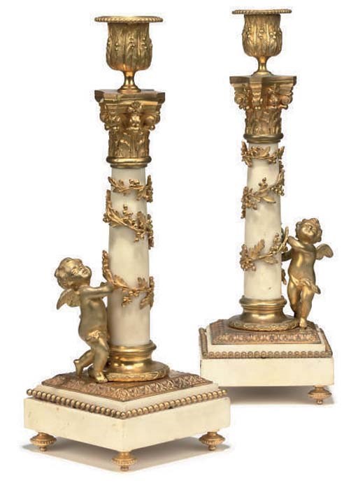 A PAIR OF FRENCH GILT-BRONZE MOUNTED WHITE MARBLE CANDLESTICKS