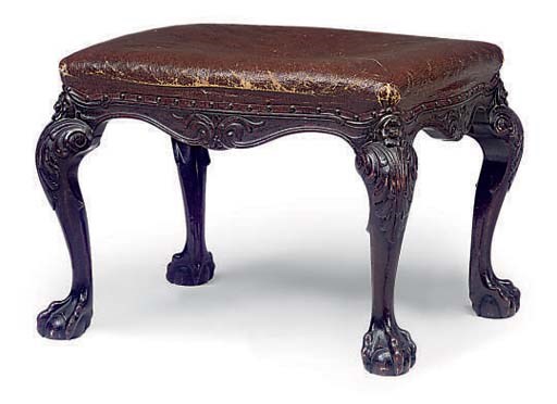 A LARGE LATE VICTORIAN WALNUT SERPENTINE STOOL