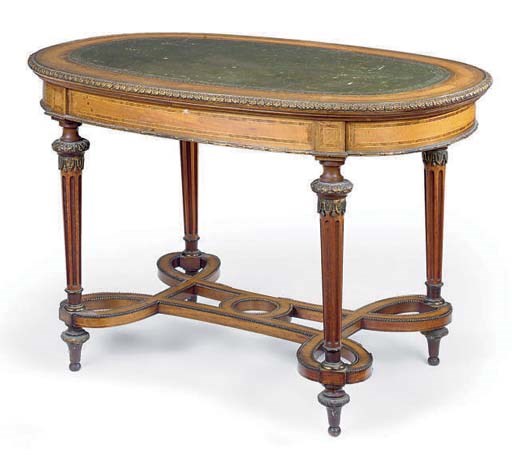 A VICTORIAN GILT-METAL MOUNTED SATINWOOD, YEWWOOD AND PURPLEHEART WRITING TABLE