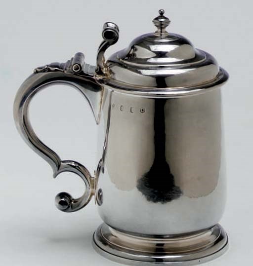 A GEORGE I SILVER TANKARD,