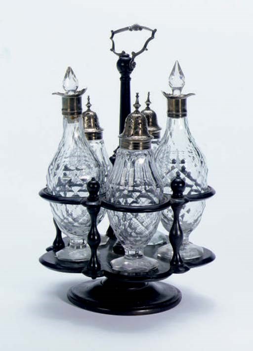 AN ANGLO-IRISH SILVER-MOUNTED CUT-GLASS CRUET SET,