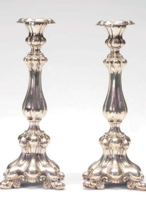 A PAIR OF CONTINENTAL SILVER CANDLESTICKS,