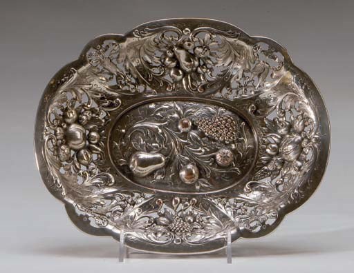 AN AMERICAN SILVERED COPPER RETICULATED BASKET,