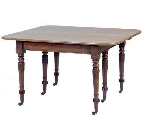 A CARVED MAHOGANY EXTENSION DINING TABLE,