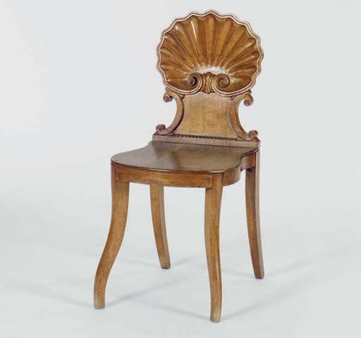 A PAIR OF EARLY VICTORIAN CARVED OAK HALL CHAIRS,