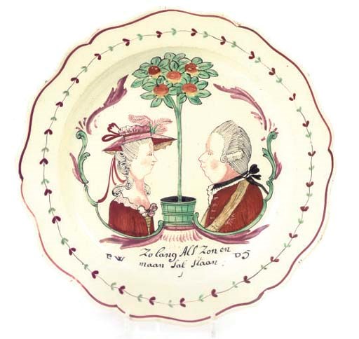 A DUTCH DECORATED LEEDS CREAMWARE ROYALIST PLATE