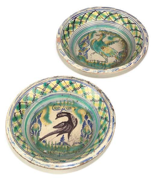 A PAIR OF CONTINENTAL FAIENCE LARGE DEEP DISHES