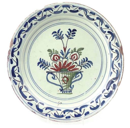 A LONDON DELFT POLYCHROME PLATE
