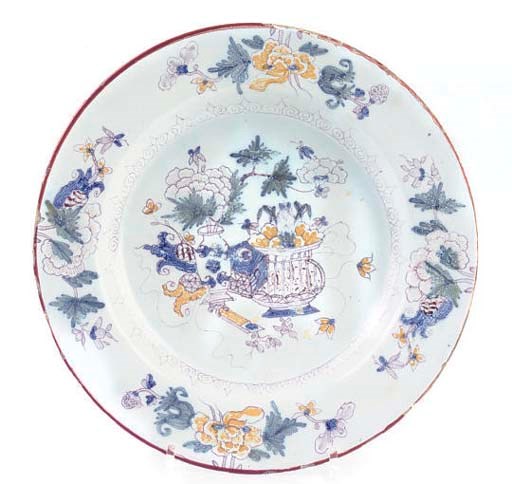 A LIVERPOOL DELFT POLYCHROME SMALL DISH