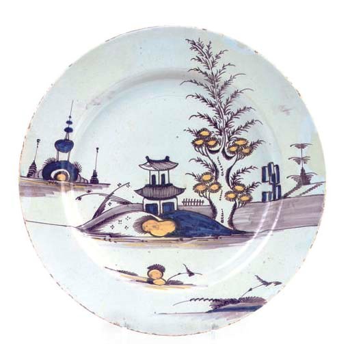A LONDON DELFT POLYCHROME DISH