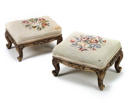 A PAIR OF FRENCH WALNUT FOOTSTOOLS