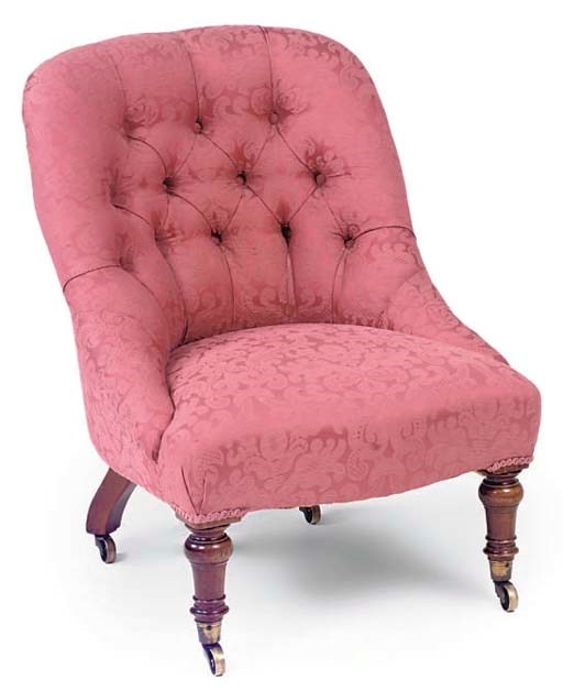 A VICTORIAN WALNUT NURSING CHAIR