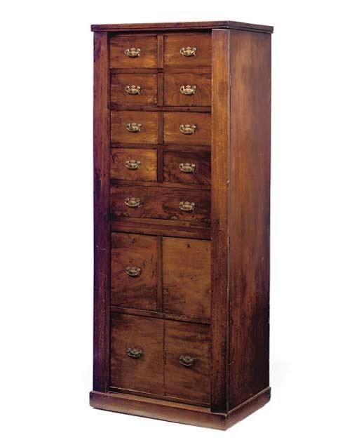 A LATE VICTORIAN MAHOGANY WELLINGTON CHEST