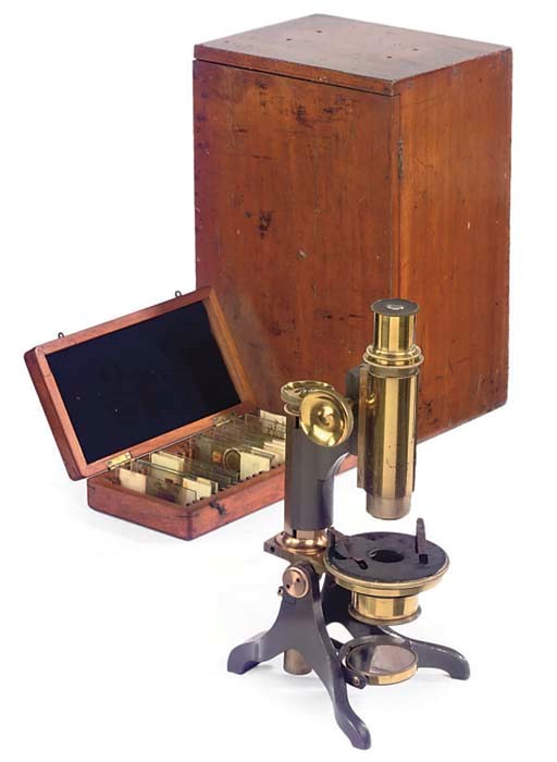 A LATE VICTORIAN LACQUERED AND OXIDISED BRASS MONOCULAR COMPOUND MICROSCOPE