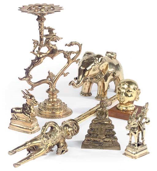A GROUP OF SIX ASIAN AND INDIAN BRASS OBJECTS