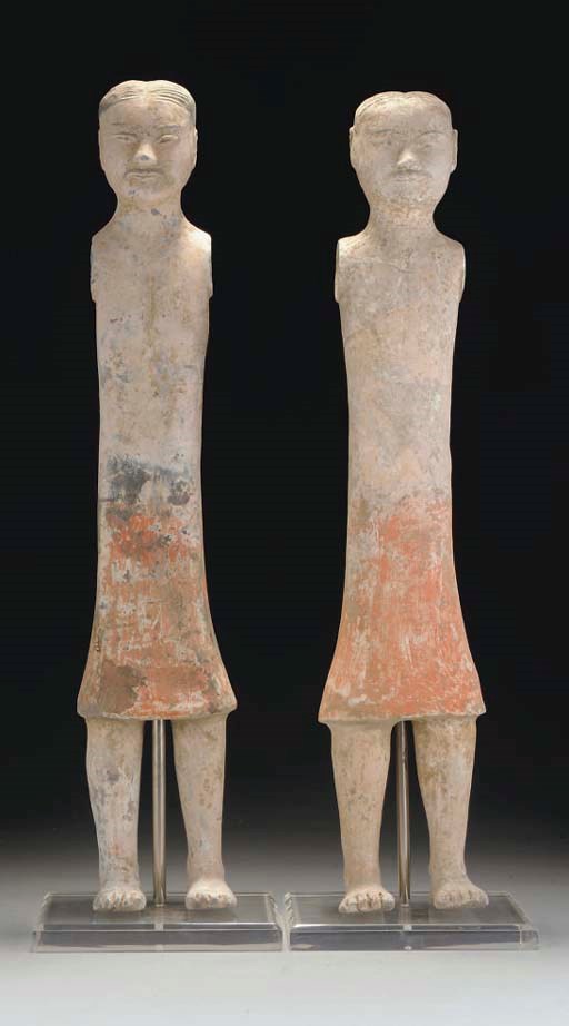 Two similar Chinese grey pottery stick figures, Han dynasty