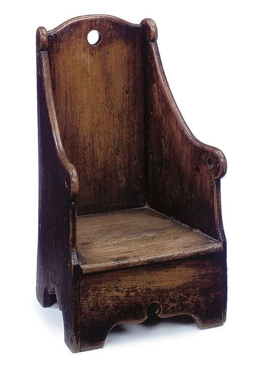 A BROWN PAINTED ELM CHILDS CHAIR