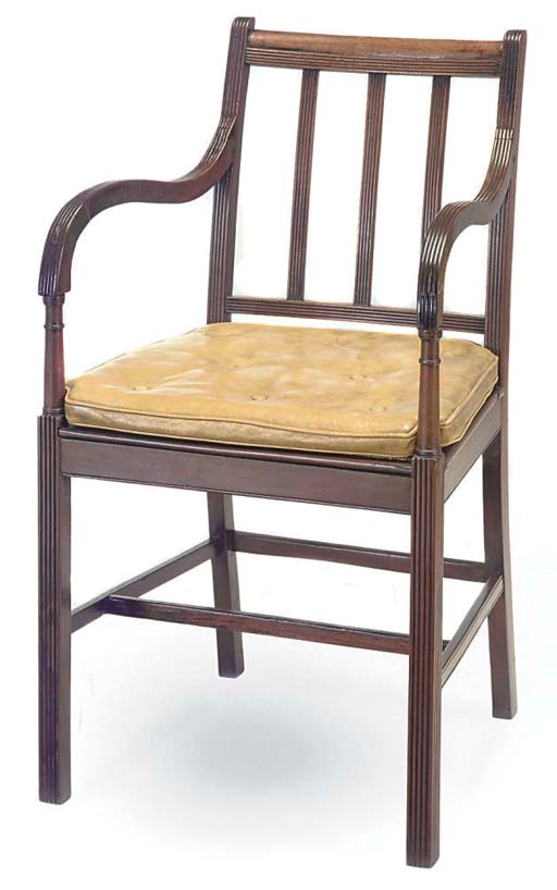 A COLONIAL PADOUK AND CANED ARMCHAIR