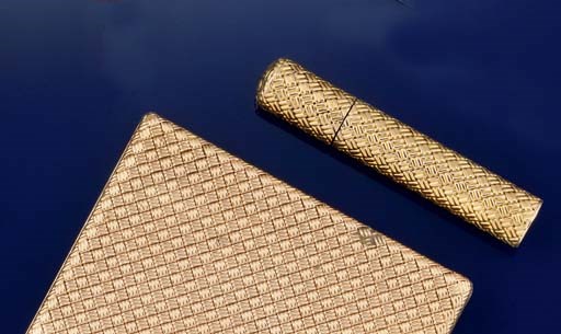A COMPACT BY BOUCHERON AND A SCENT BOTTLE BY VAN CLEEF & ARPELS