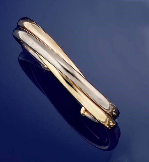 AN 18CT. THREE COLOUR GOLD BANGLE, BY CARTIER