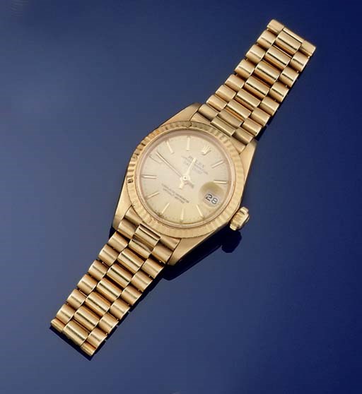A LADY'S 18CT. GOLD AUTOMATIC WRISTWATCH, BY ROLEX