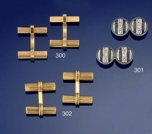 A PAIR OF ROCK CRYSTAL, DIAMOND AND ENAMEL CUFFLINKS