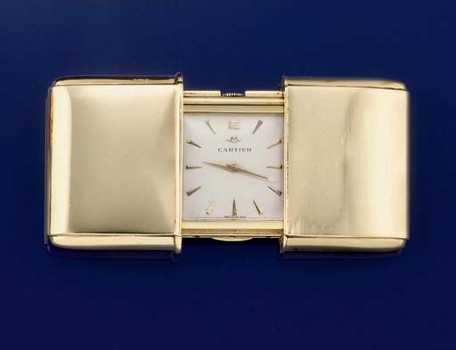 A PURSE WATCH, RETAILED BY CARTIER