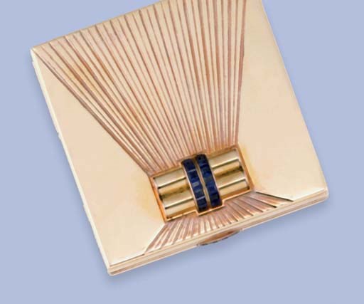 A French Art Deco gilded metal compact, by Boucheron