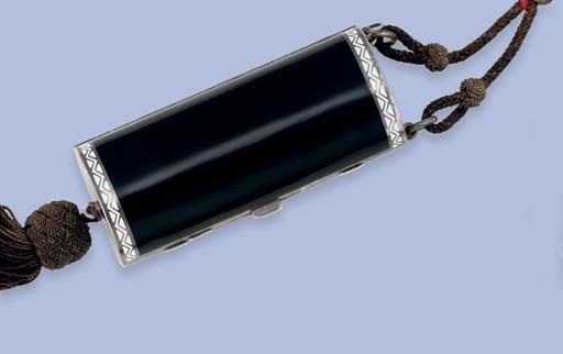 AN ART DECO BLACK AND WHITE ENAMEL CARNET DE BAL AND VANITY CASE