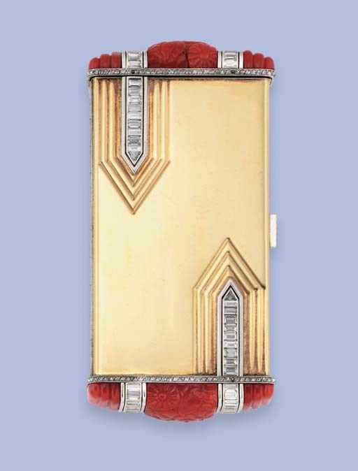 AN AMERICAN ART DECO DIAMOND AND CORAL SET COMPACT