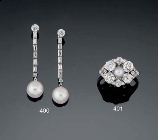 A pair of pearl and diamond ear pendants