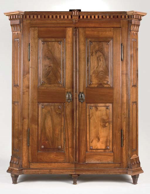 AN AUSTRIAN BRASS-MOUNTED WALNUT CUPBOARD