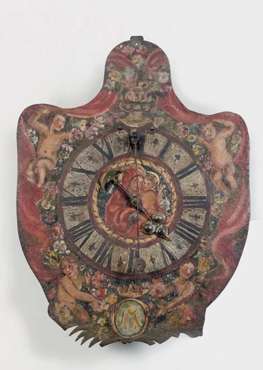 A POLYCHROME PAINTED IRON WALL CLOCK