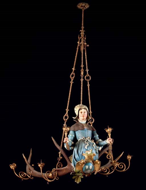 A GERMAN POLYCHROME DECORATED LUESTERWEIBCHEN