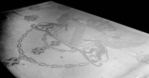 A PAIR OF DAMASK LINEN FLORAL AND ARMORIAL TABLECLOTHS