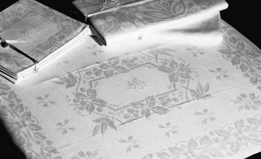 A DAMASK LINEN TABLECLOTH