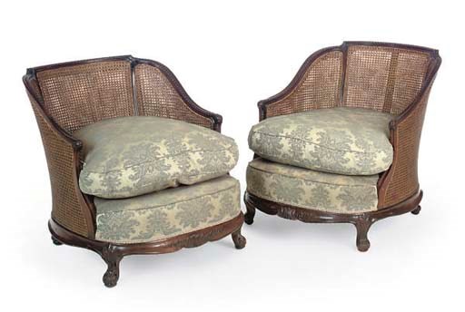 A PAIR OF CARVED MAHOGANY CANED BERGERES
