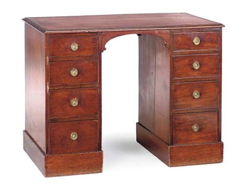 A LATE VICTORIAN MAHOGANY KNEEHOLE DESK