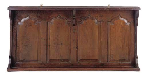 AN OAK HANGING SHELF/RACK