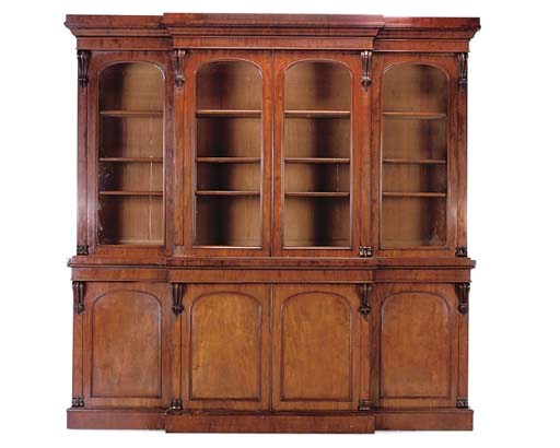 AN EARLY VICTORIAN MAHOGANY BREAKFRONT BOOKCASE