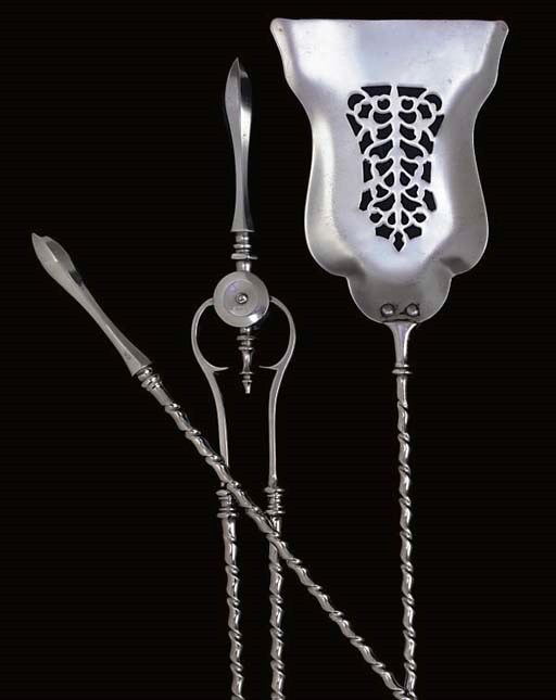 A SET OF VICTORIAN POLISHED STEEL FIRE-IRONS