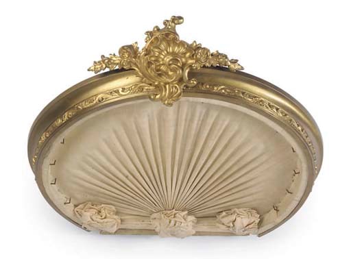 A FRENCH GILT-BRASS BED CORONA