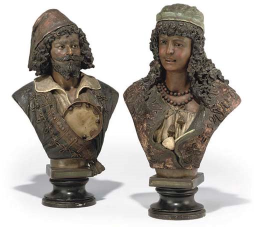 A PAIR OF AUSTRIAN COLD-PAINTED TERRACOTTA BUSTS OF GYPSIES
