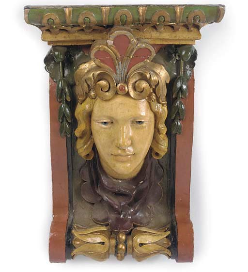 A PAIR OF PAINTED WOOD WALL BRACKETS